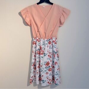 Peach and floral dress size medium. New without tags.